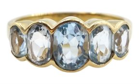 9ct gold graduating five stone oval blue topaz ring