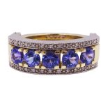 14ct gold tanzanite and diamond swivel ring