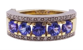 14ct gold tanzanite and diamond swivel ring