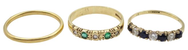 Gold five stone emerald and diamond ring