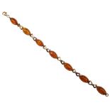 9ct gold oval Baltic amber cross link bracelet