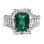 18ct white gold emerald and round brilliant cut diamond cluster ring