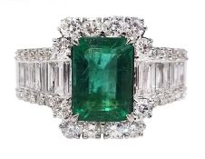 18ct white gold emerald and round brilliant cut diamond cluster ring