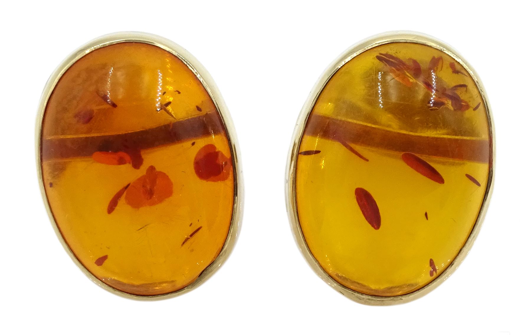 Pair of 9ct gold oval Baltic amber stud earrings