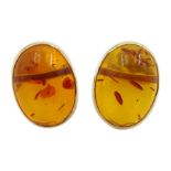 Pair of 9ct gold oval Baltic amber stud earrings