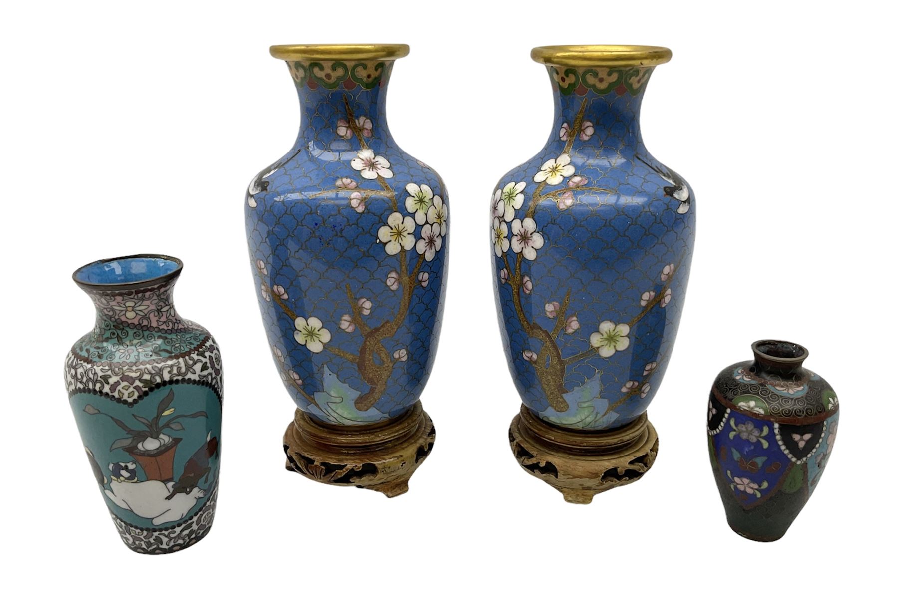 Pair of Chinese cloisonne vases on wooden stands