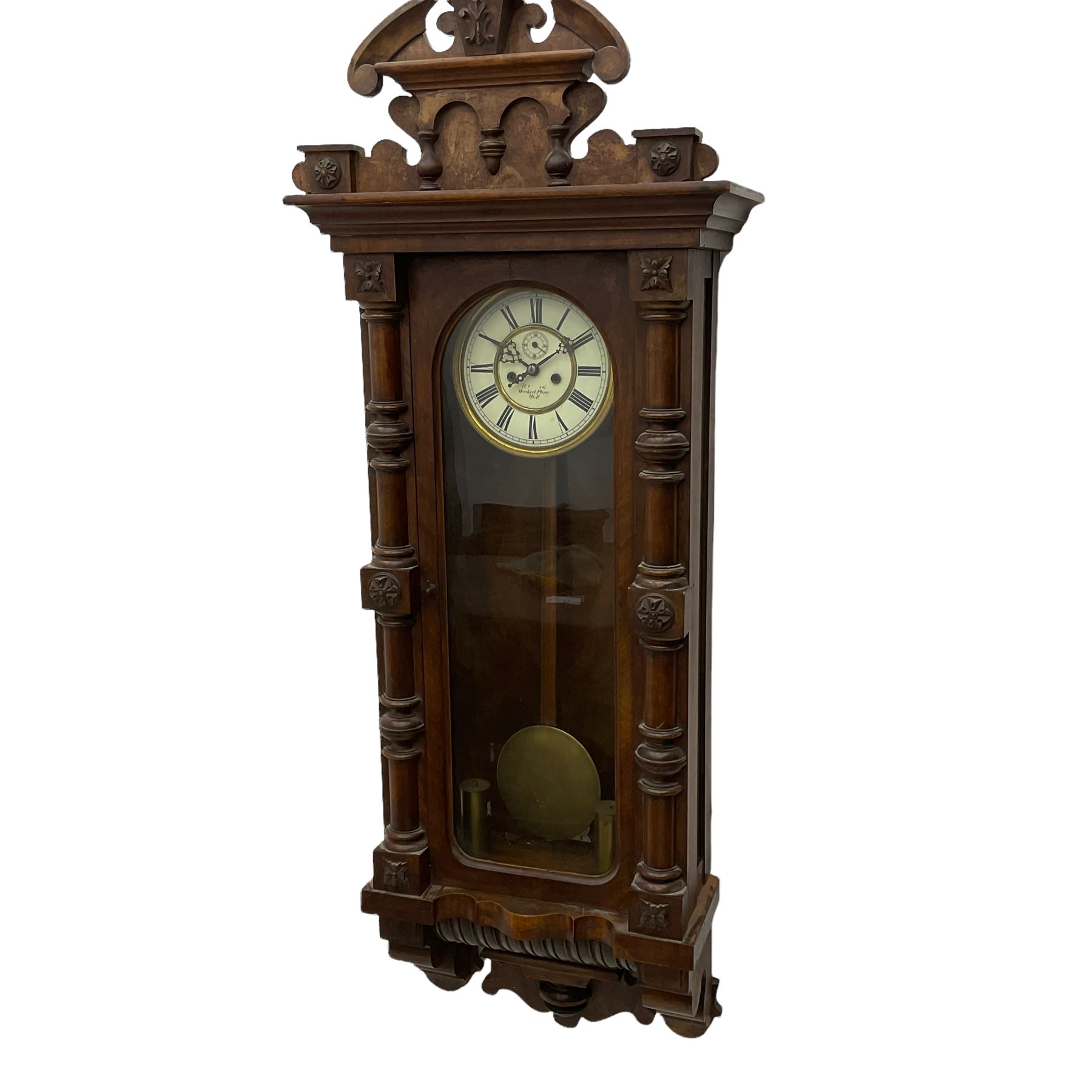 A large German wall clock c 1890 with a twin weight striking movement