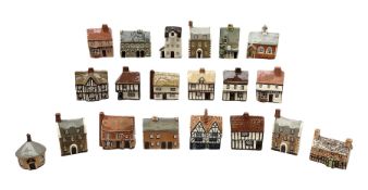 Twenty studio pottery figures of houses and cottages