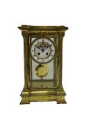 Late 19th century French brass four glass mantle clock by Samuel Marti of Paris