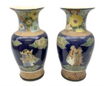 Pair of oriental floor vases of baluster form