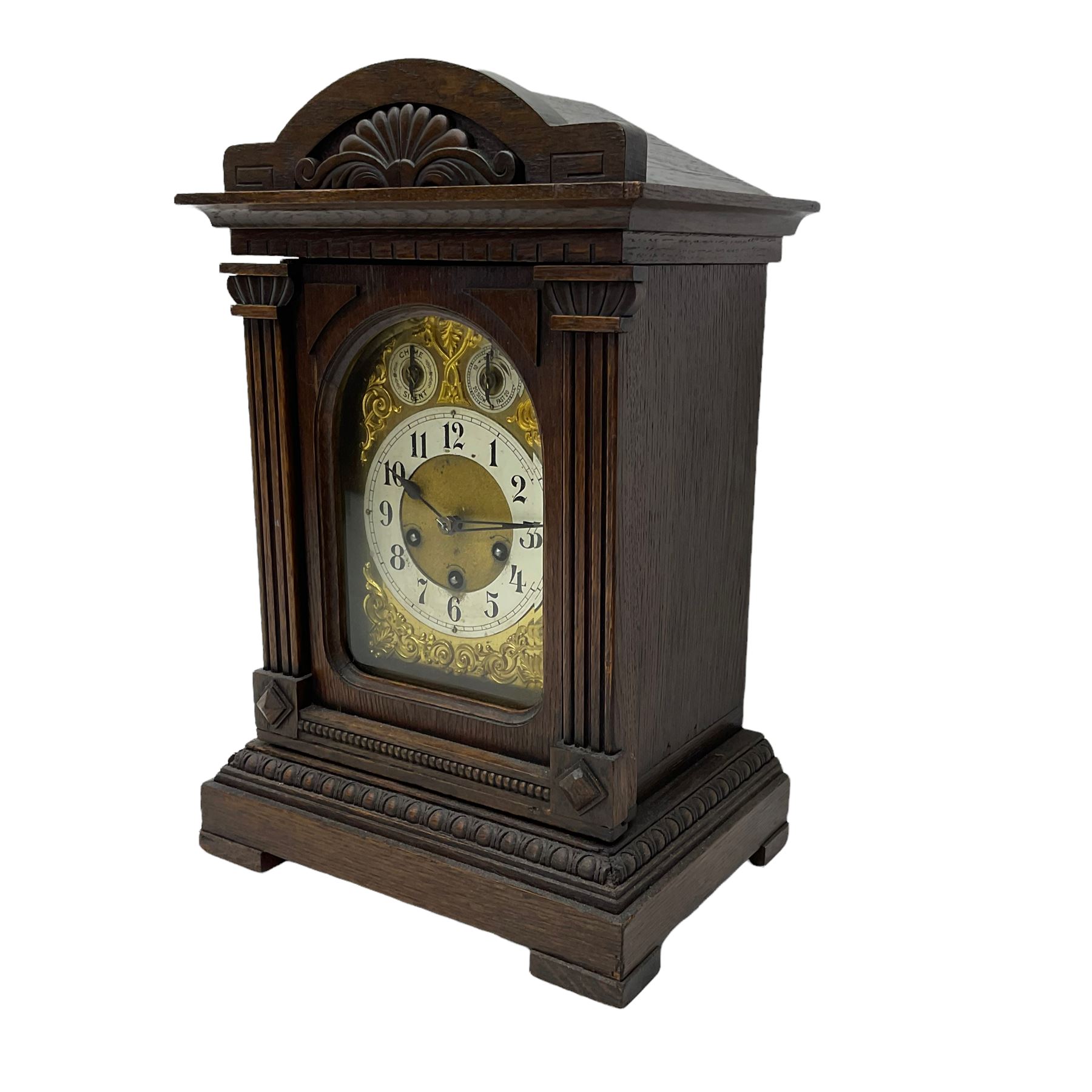 A German carved oak cased mantle clock with a raised pediment - Image 2 of 3