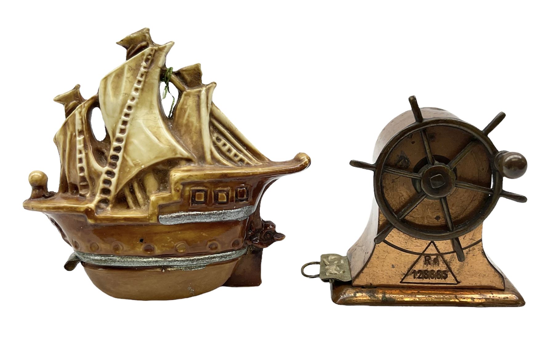 Copper tape measure in the form of a ship`s wheel