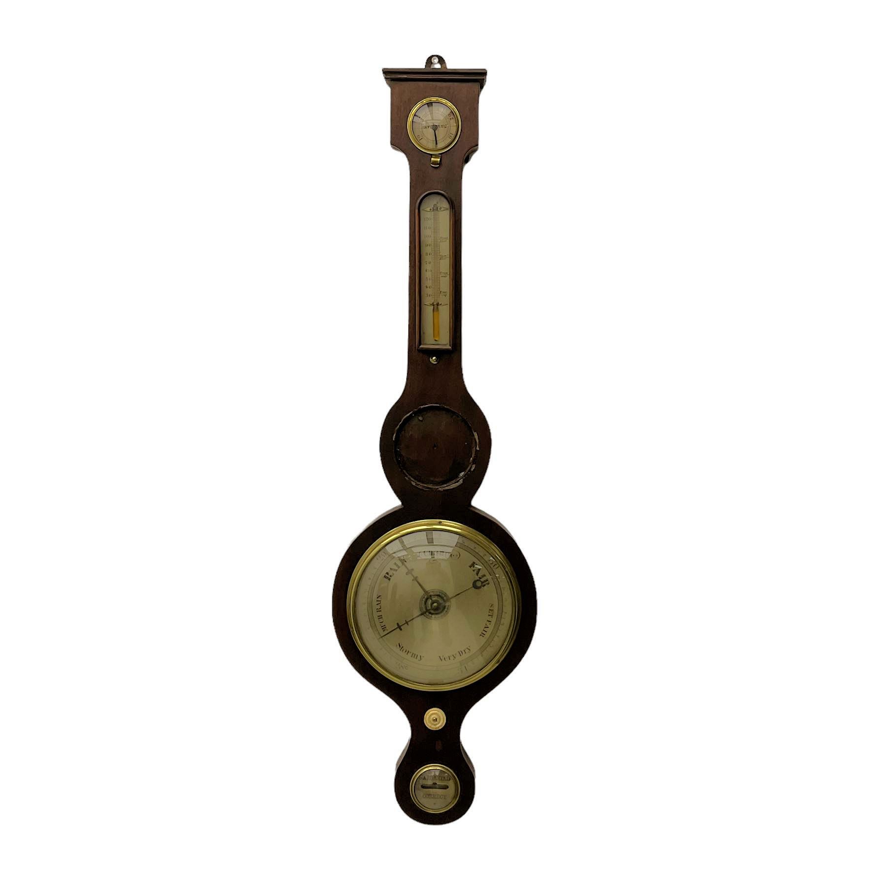 A Victorian mahogany wheel barometer with a mercury cistern