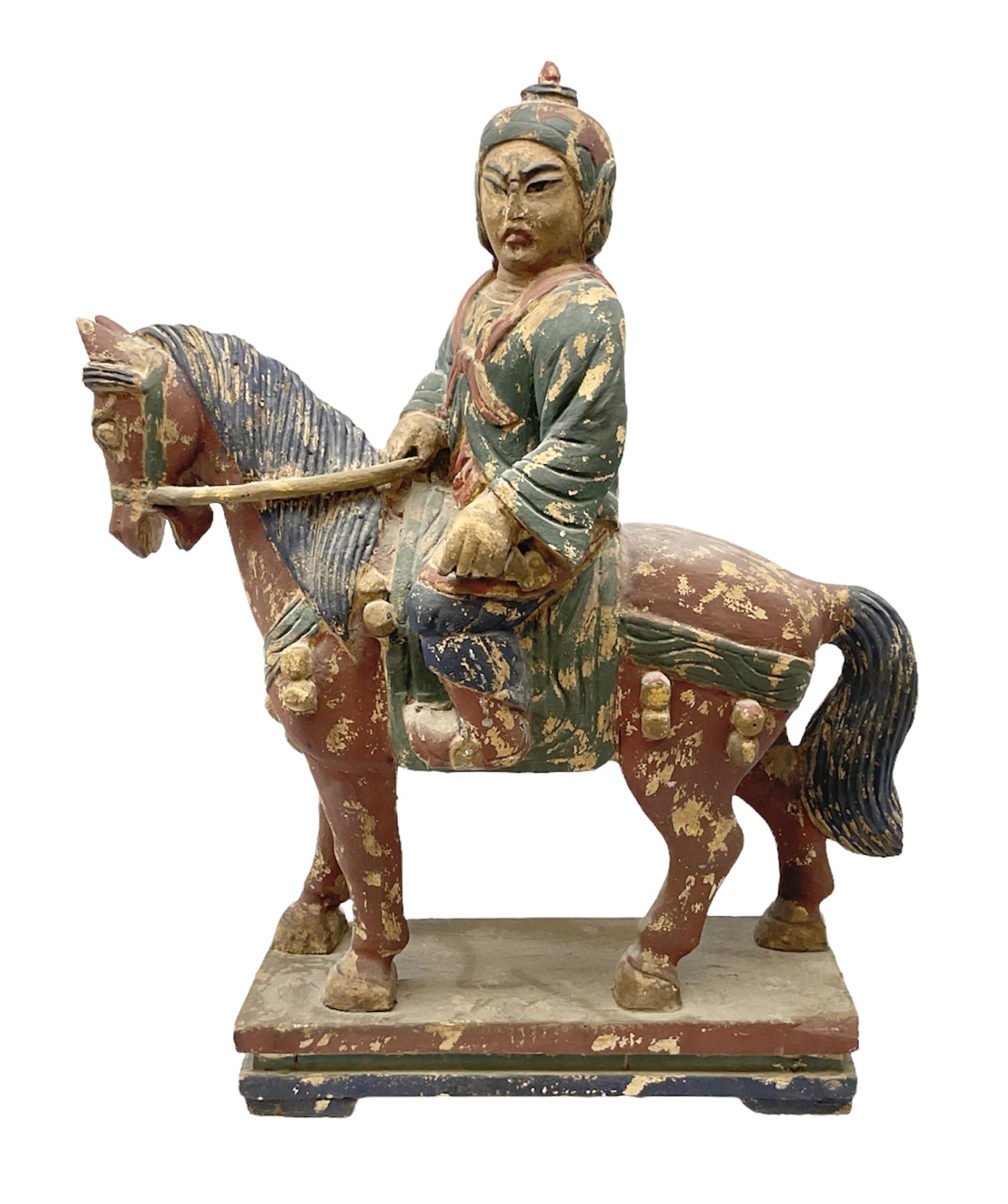 Large carved wood painted figure of warrior on horseback