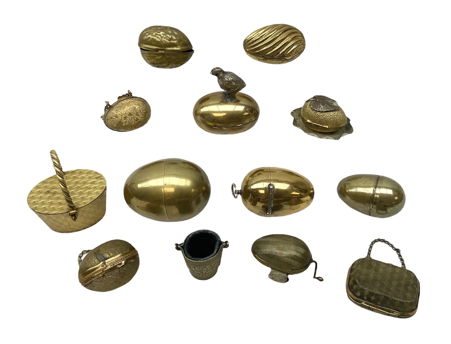 Eleven 19th century and later metal thimble cases