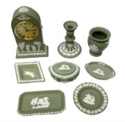 Collection of Wedgwood sage green Jasperware to include mantel clock decorated with classical scene
