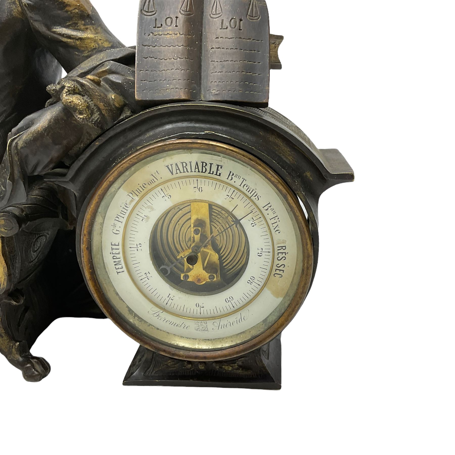 A late 19th century French aneroid barometer housed in a spelter case in the form of a reclining lad - Image 2 of 3