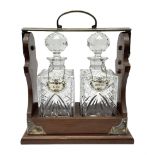 Late 20th century mahogany and silver plated two cut glass decanter tantalus