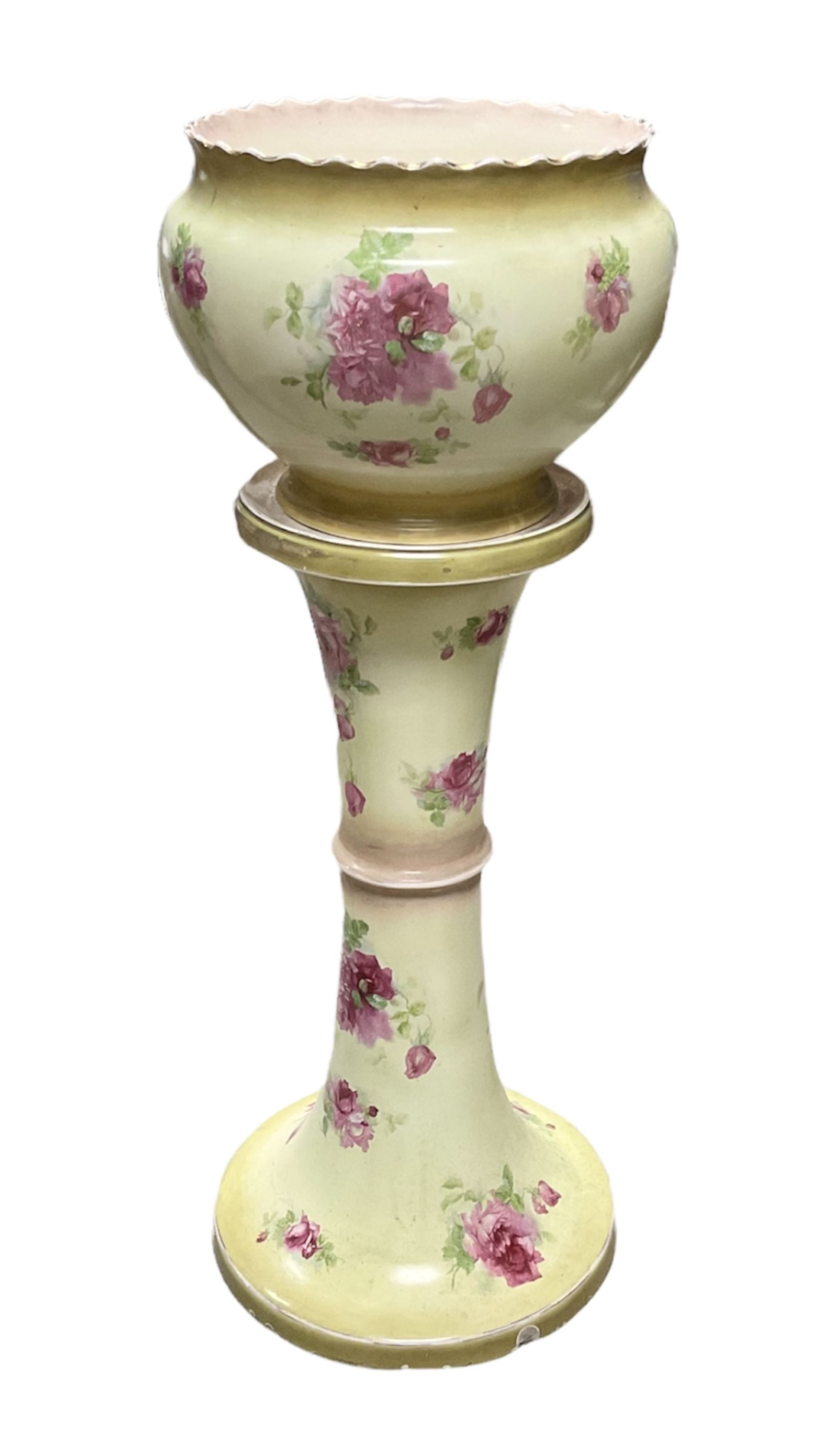 An early 20th century ceramic jardiniere on stand