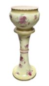 An early 20th century ceramic jardiniere on stand