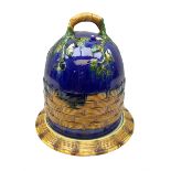 Majolica style cheese dome and dish with floral and woven basket effect decoration