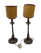 Pair of Continental mahogany lamps of fluted column form