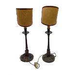 Pair of Continental mahogany lamps of fluted column form