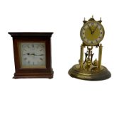 400 day anniversary clock and a quartz mantle clock