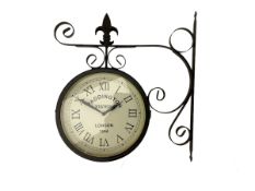 Wall bracket clock with suspended twin 9" dials