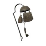 Rustic door bell modelled from three cow bells