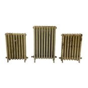 Three cast iron radiators