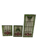 Three stained and leaded glass windows panels