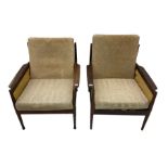 Pair of mid-20th century teak framed upholstered armchairs