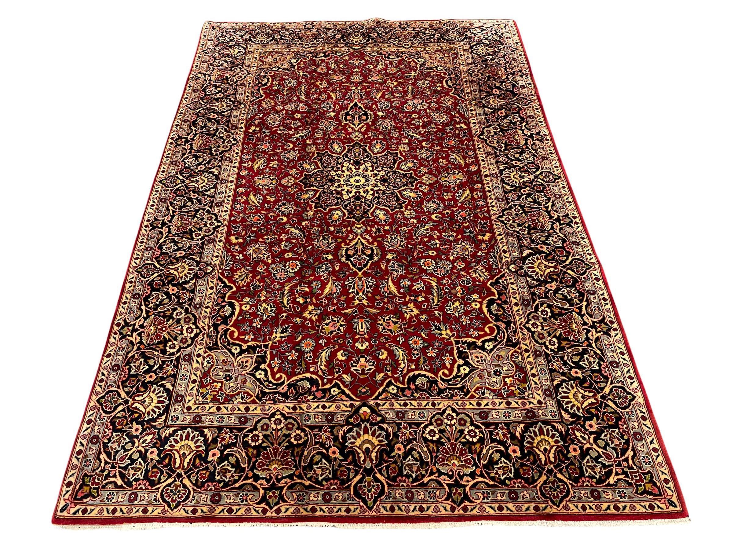 Persian red ground Kashan rug