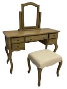 Washed solid oak kneehole dressing table fitted with five drawers with matching freestanding mirror