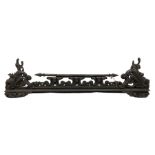 Late 19th century ornate cast iron fire fender