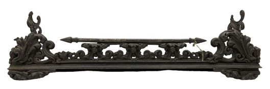 Late 19th century ornate cast iron fire fender