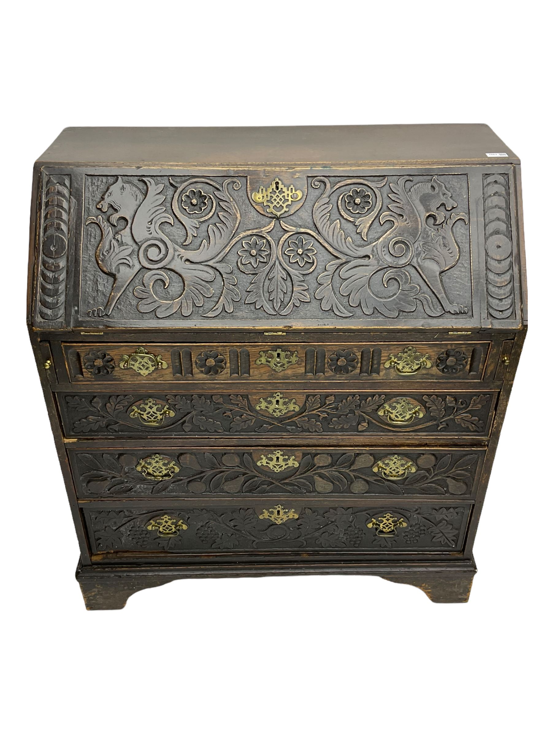 19th century carved oak bureau