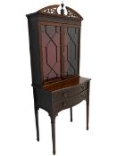 Edwardian mahogany tall and narrow display cabinet with scroll pierced broken arch pediment over two