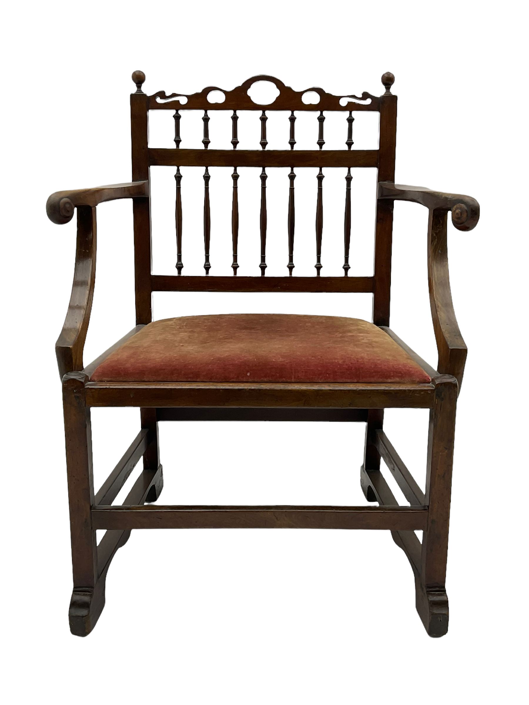 Late 18th century walnut 'Drunkard's' chair