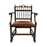 Late 18th century walnut 'Drunkard's' chair