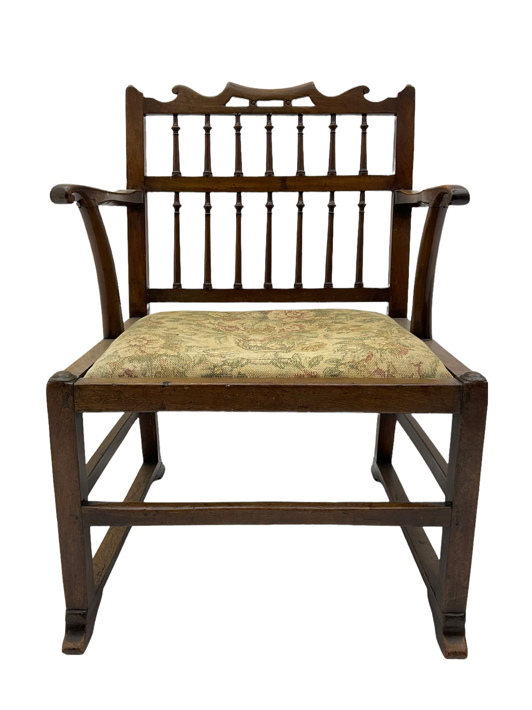 Late 18th century walnut 'Drunkard's' chair