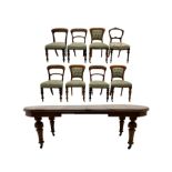 19th century mahogany extending dining table with two leaves and ten mixed spoon back chairs