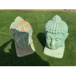 Pair of composite paimted Buddha heads