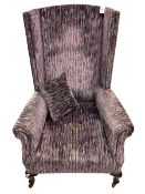 Early 20th century high wing back armchair