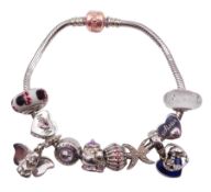 Pandora silver bracelet with four Disney charms including Lady and the Tramp and Dumbo droplet charm