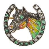Horseshoe and enamelled horses head brooch set with emeralds and diamonds