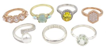 Six silver and silver-gilt stone set rings and a silver wedding band