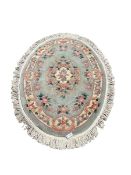 Chinese washed woollen oval rug