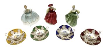 Four Paragon tea cups and saucers with gilt and floral decoration in various colours